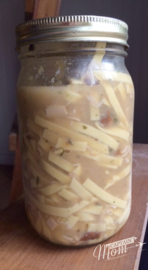 Jar of homemade rotisserie chicken noodle soup by Rhonda Franz
